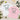 BRIDE CLUB und CREW CLUB Shirts als Flatlay mit Tennisball, Sekt und Olivenzweigen