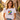 Frau traegt weisses JGA T-Shirt mit Aquarell-Regenbogenherz und Schriftzug Liebe gewinnt in sommerlicher Altstadtgasse
