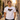Mann traegt weisses JGA T-Shirt mit Retro-Regenbogen-Schriftzug Braeutigam Crew in sommerlicher Altstadtgasse