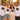 Gemischte JGA Crew in weissen T-Shirts mit Retro-Regenbogen-Schriftzug Trau dich bei goldener Stunde