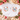 Flatlay: Bride und Bride Squad Shirt mit Hexagon-Blumenrahmen auf hellem Holz