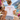 Frau von hinten mit Bride & Pride Backprint-Shirt auf mediterranem Balkon mit Meerblick