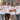 JGA-Crew in Mission-Verheiratet-Shirts vor einer Graffitiwand