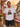 Mann traegt weisses JGA T-Shirt Liebe gewinnt Retro Regenbogen auf Positano-Balkon
