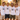 Braeutigam-Crew in weissen JGA T-Shirts Braeutigam Crew im Regenbogen-Rahmen bei goldener Stunde