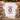 Bride's Last Rodeo Einhorn JGA T-Shirt als Flatlay auf Holz mit Cowboyhut, Lasso und Hufeisen