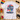 Cologne Pride Köln JGA T-Shirt Damen Flatlay mit Regenbogenfahne, Kamera und Blüten