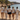 JGA Damen-Crew mit gelbem Ibiza T-Shirt in einer ruhigen Bucht auf Ibiza