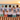 JGA-Crew mit Playa Crew Mallorca T-Shirts am Strand bei Sonnenuntergang
