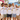 Fünf Männer in weißen LGBIERTQ+ JGA T-Shirts auf Mallorca
