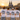 JGA-Crew mit Kölsch-Crew-Shirts am Rheinufer vor Dom und Hohenzollernbrücke