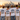 JGA-Crew mit Main-Crew-Frankfurt-Shirts auf dem Eisernen Steg vor der Skyline