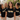 Braut-Crew im schwarzen Team Bride Gold Shirt im Partnerlook beim Junggesellinnenabschied